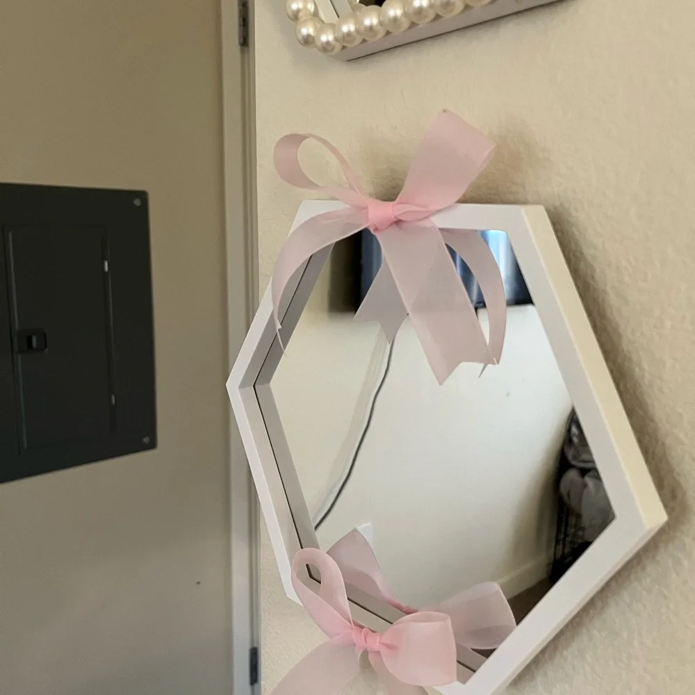 Hexagonal White Wall Mirrors with Pink Ribbon